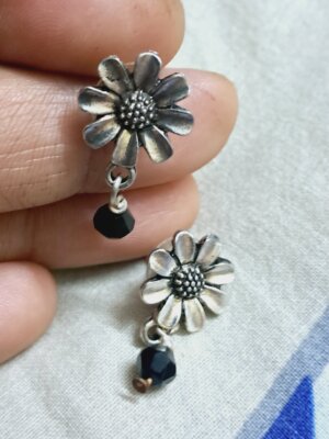 Floral stud earrings with antique silver-tone finish and a black bead dangle – EAOX0006