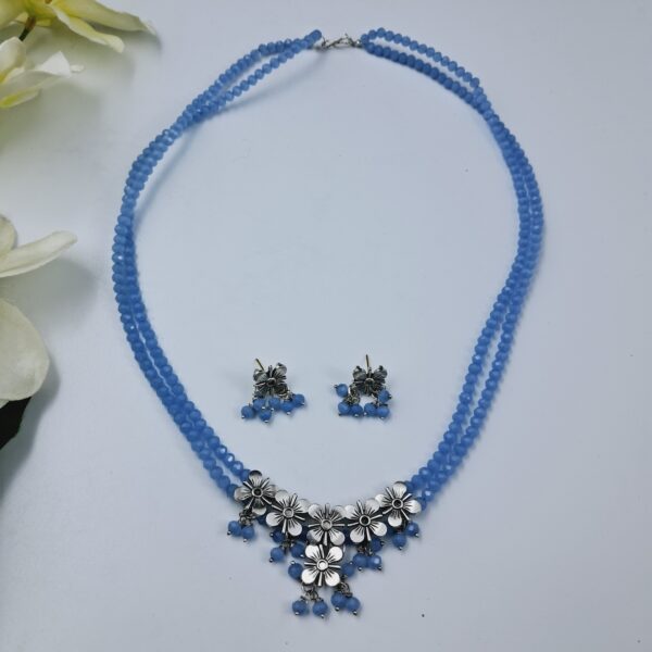 Oxidized Floral Necklace Set with Dual Blue Beads and Dangling Charms - JSBE0026
